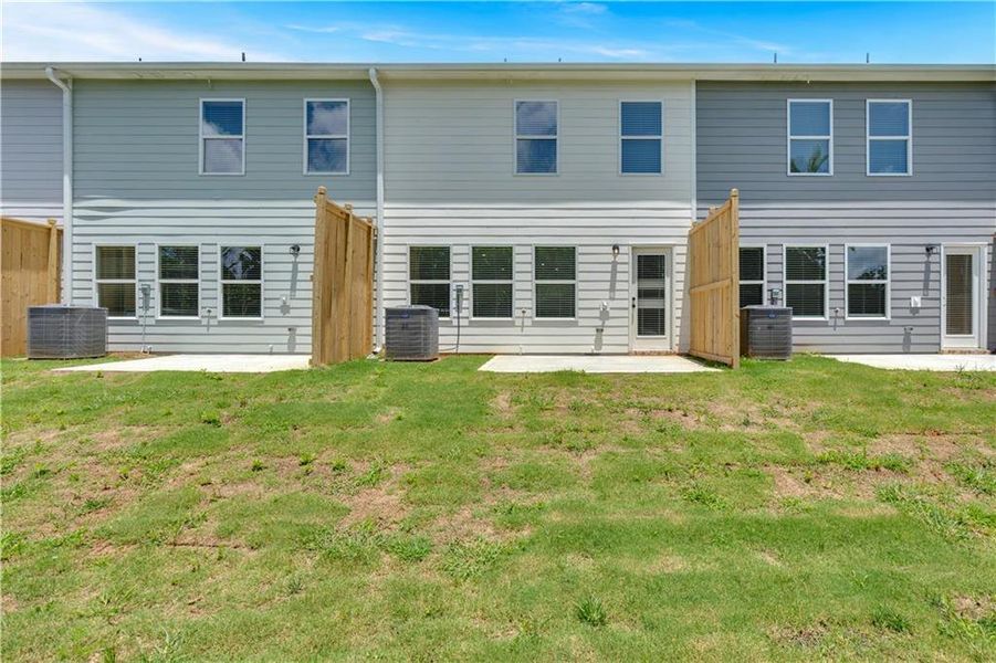 Front exterior of a new home in Village Green, Adairsville, GA, highlighting curb appeal (Image 24).