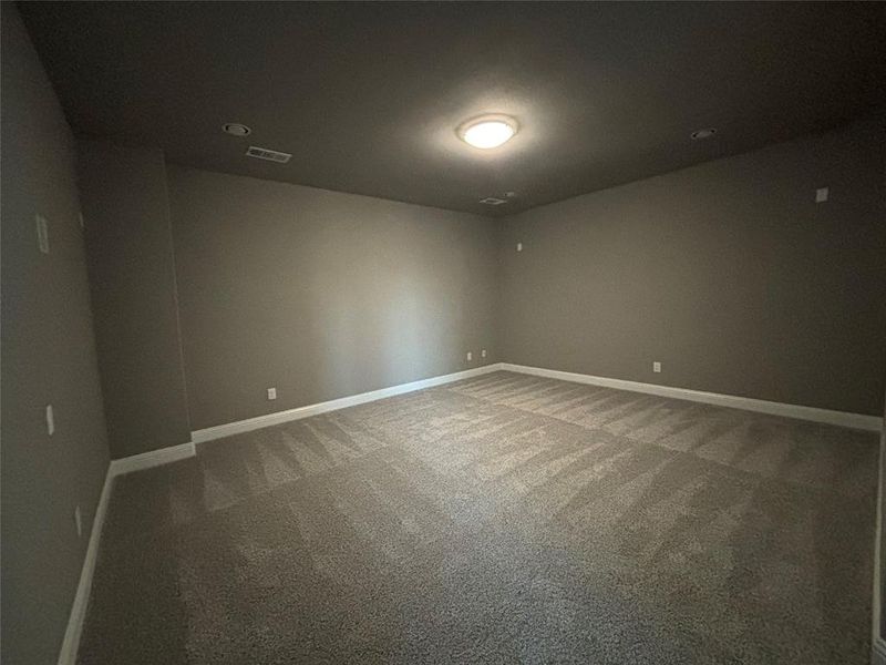 Empty room featuring carpet floors