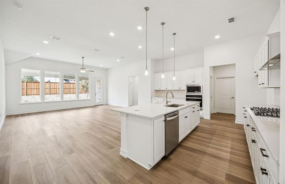 *Floorplan representation, not actual home - Large island overlooking gathering room and dining areas