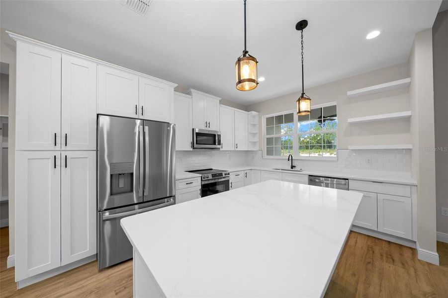Furnished interior view inside a new home in , Dunnellon (Image 9).