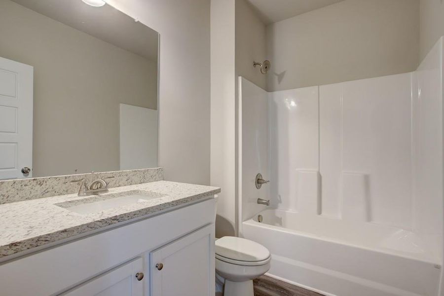 Furnished interior view inside a new home in Sutton's Landing, Statham (Image 8).