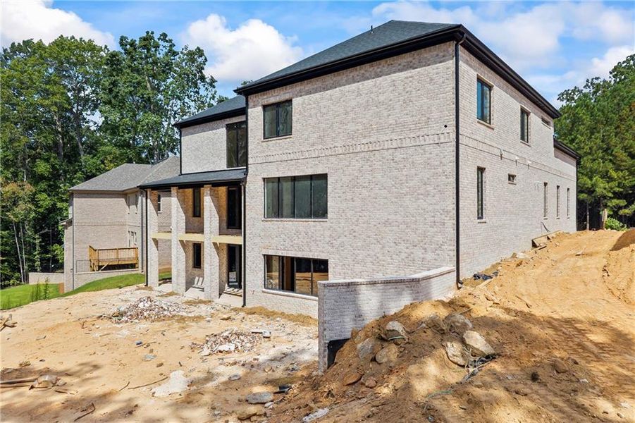 Front exterior of a new home in , Fairburn, GA, highlighting curb appeal (Image 21).