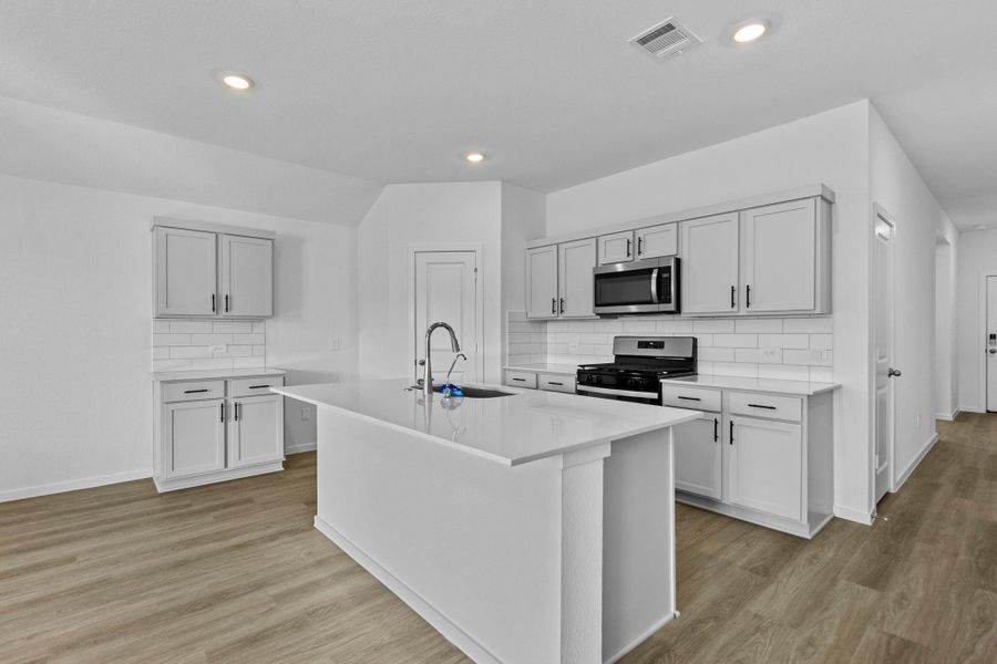 Furnished interior view inside a new home in Harrington Trails at The Canopies, Splendora (Image 8).
