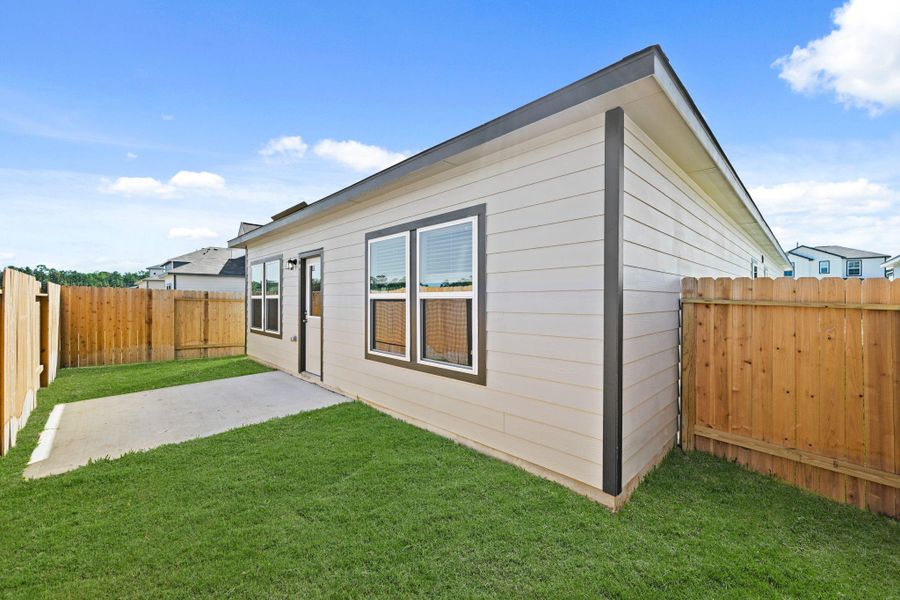 Exterior details and patio area of a home in Northpark South, Porter (Image 3). Exterior details and patio area of a home in Northpark South, Porter (Image 3).
