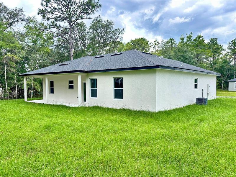 Exterior details and patio area of a home in , Citrus Springs (Image 22).
