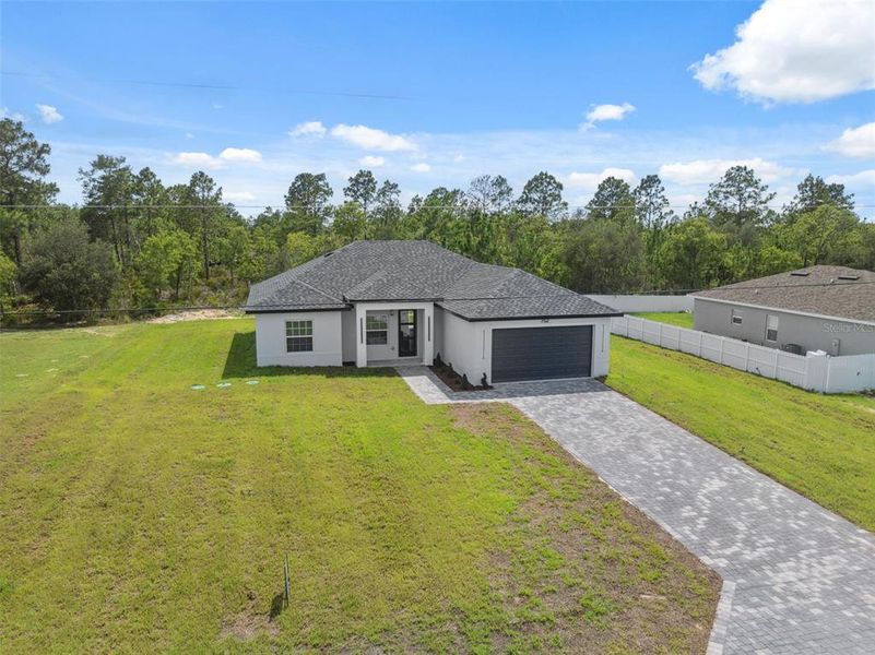 Front exterior of a new home in , Ocala, FL, highlighting curb appeal (Image 25).
