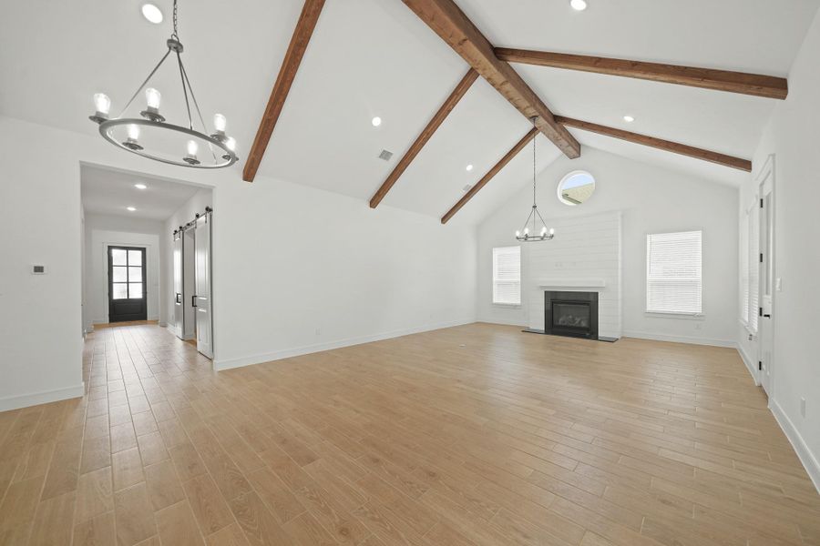 Open dining area and great room with fireplace (*Photo not of actual home and used for illustration purposes only.) Open dining area and great room with fireplace (*Photo not of actual home and used for illustration purposes only.)