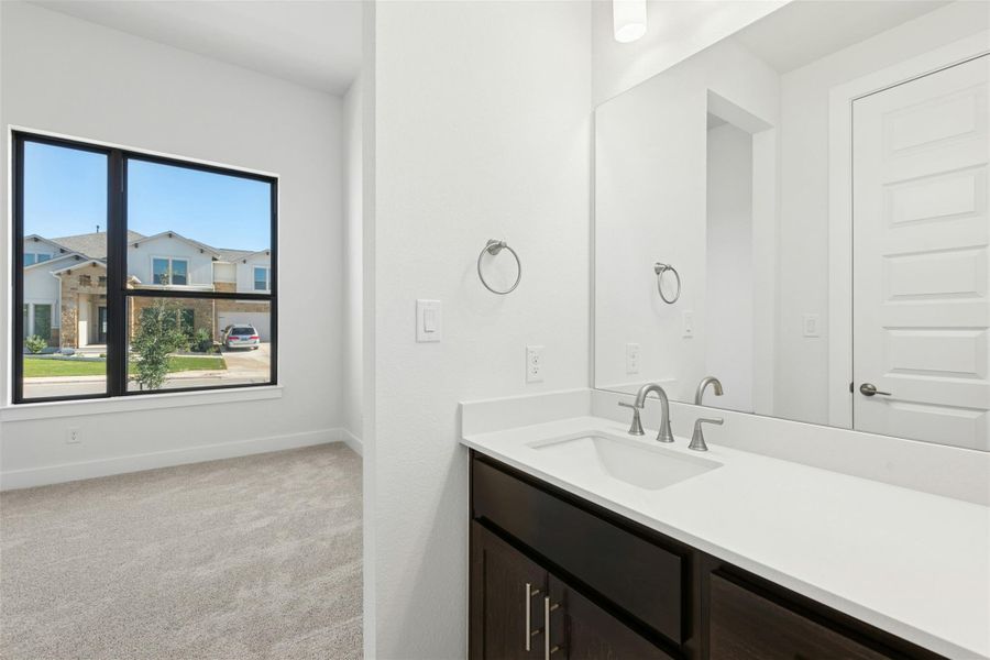 Furnished interior view inside a new home in Riverstone, Georgetown (Image 10).