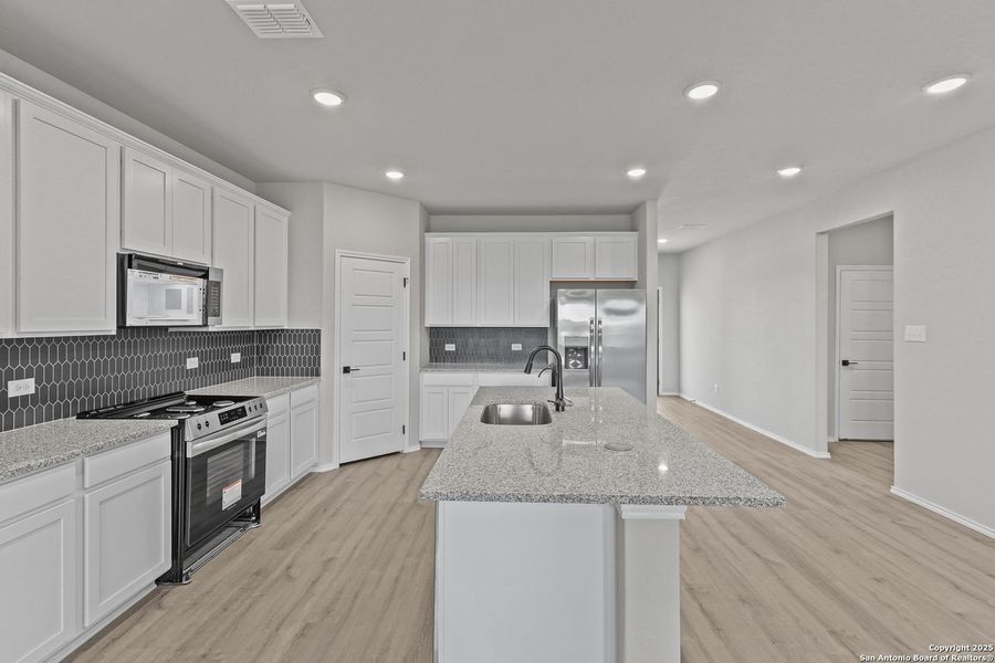 Furnished interior view inside a new home in Comanche Ridge, San Antonio (Image 52). Furnished interior view inside a new home in Comanche Ridge, San Antonio (Image 52).