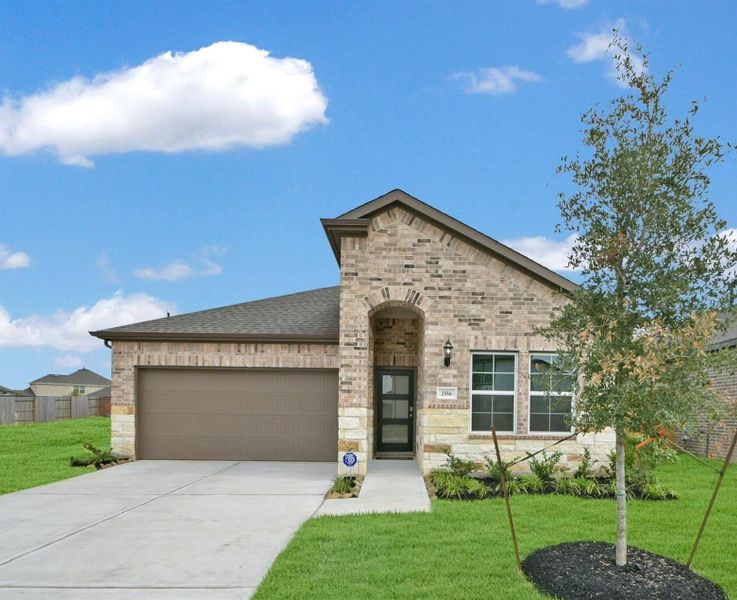 Front exterior of a new home in Sunterra, Katy, TX, highlighting curb appeal (Image 139). Front exterior of a new home in Sunterra, Katy, TX, highlighting curb appeal (Image 139).