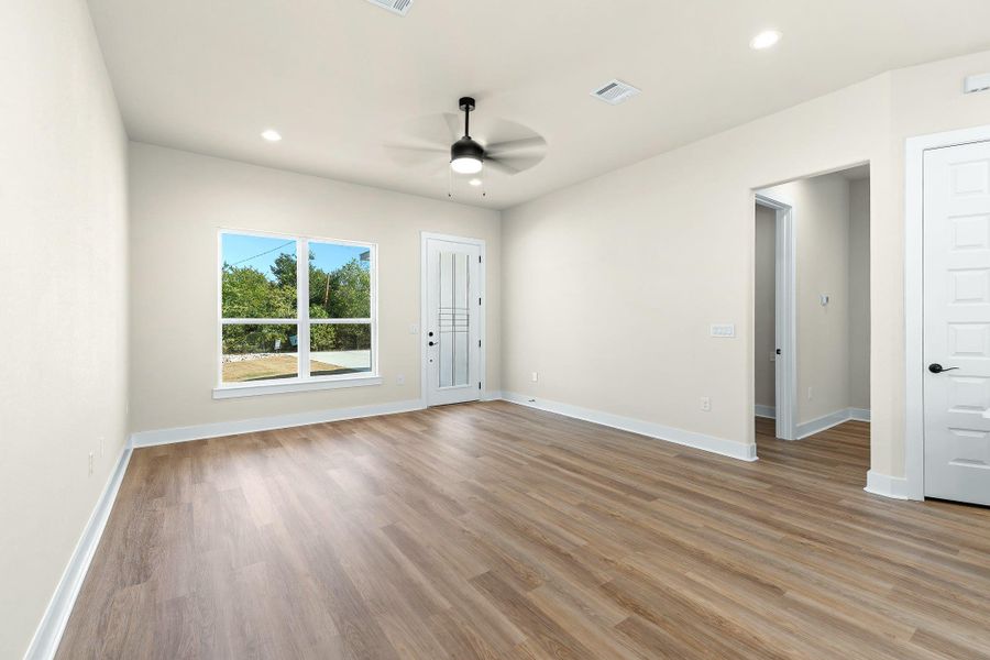 Unfurnished room with recessed lighting, light wood-style floors, and ceiling fan