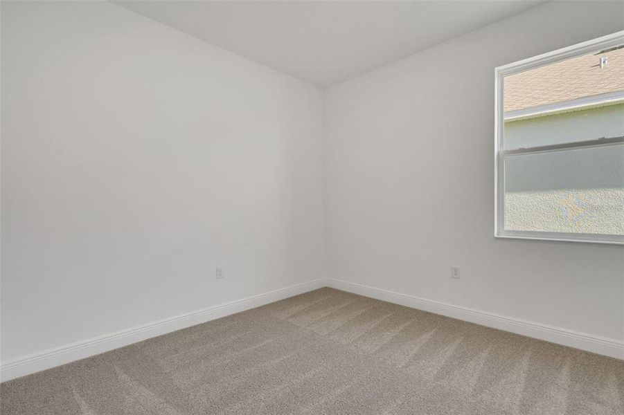 Spacious, unfurnished interior of a new home in Reserve at Hammock Oaks, Lady Lake (Image 16).