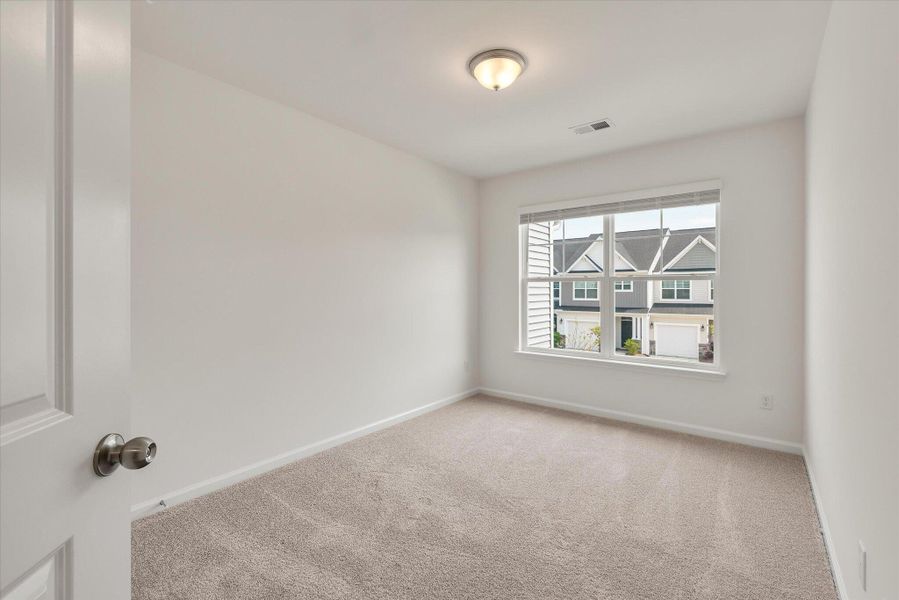 Spacious, unfurnished interior of a new home in The Landings at Montague, Goose Creek (Image 22).