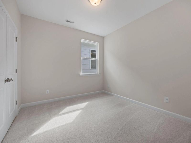 Spacious, unfurnished interior of a new home in Forestville Yard, Knightdale (Image 30).