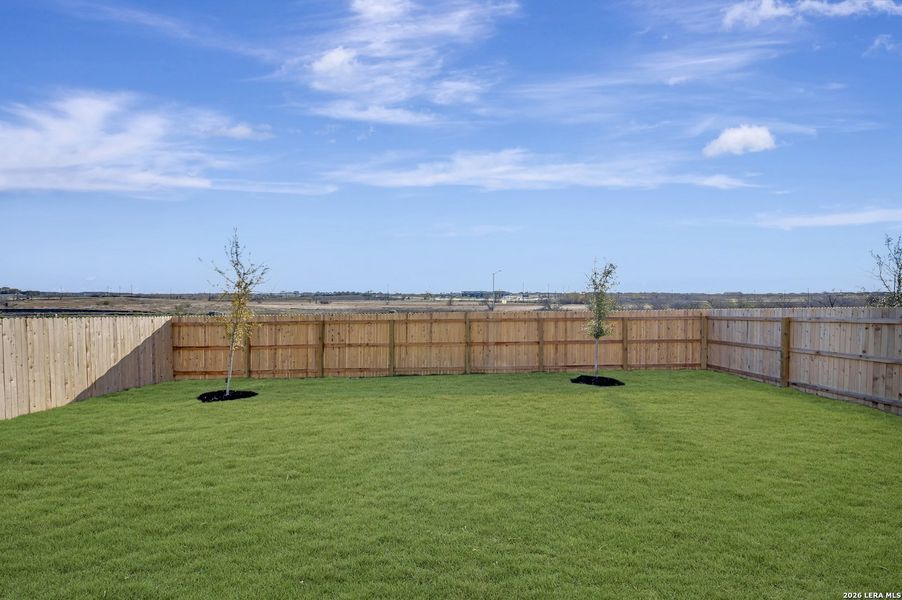 Exterior details and patio area of a home in Paloma Park, Converse (Image 26).