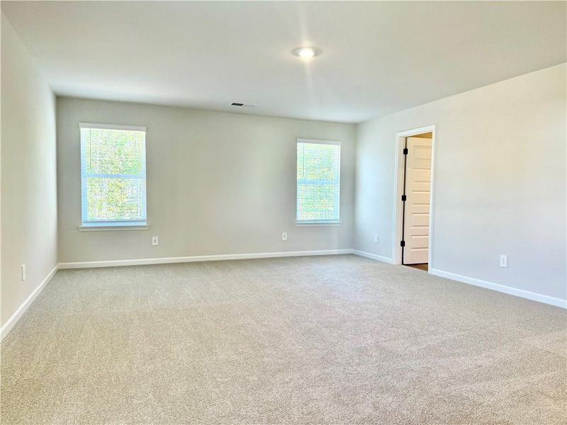 Spacious, unfurnished interior of a new home in Vines at Mill Creek - Estate Series, Braselton (Image 19). Spacious, unfurnished interior of a new home in Vines at Mill Creek - Estate Series, Braselton (Image 19).