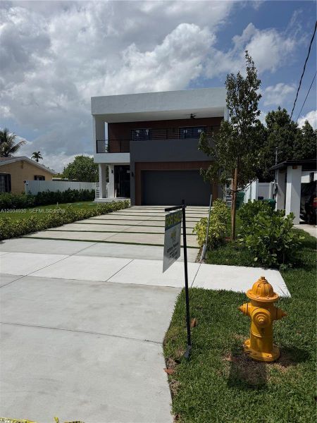 Front exterior of a new home in , Miami, FL, highlighting curb appeal (Image 2). Front exterior of a new home in , Miami, FL, highlighting curb appeal (Image 2).