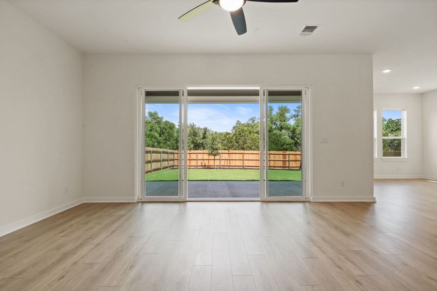 Spacious, unfurnished interior of a new home in Heritage, Dripping Springs (Image 28).