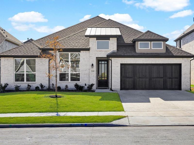 Front exterior of a new home in Nelson Lake, Rockwall, TX, highlighting curb appeal (Image 1). Front exterior of a new home in Nelson Lake, Rockwall, TX, highlighting curb appeal (Image 1).