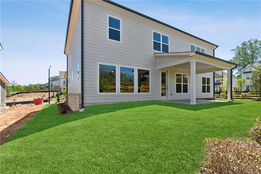 Exterior details and patio area of a home in Havencroft, Woodstock (Image 3).