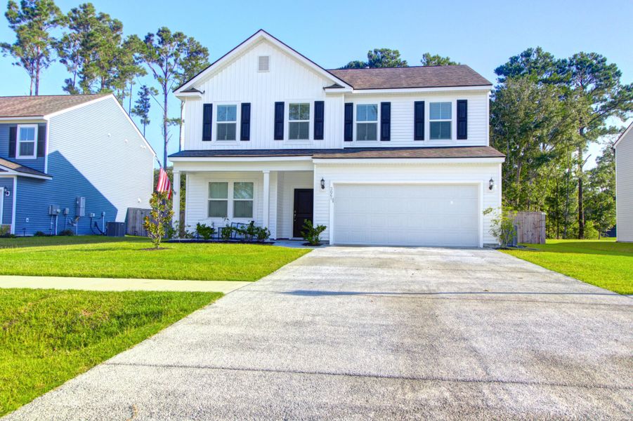 Front exterior of a new home in Sea Island Preserve, Johns Island, SC, highlighting curb appeal (Image 20).