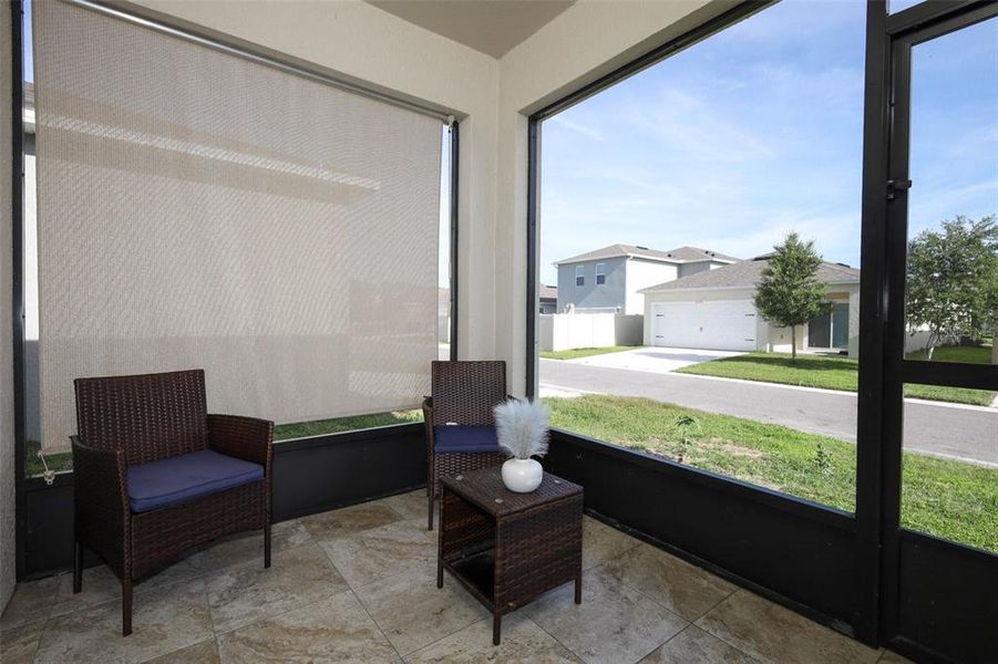 Exterior details and patio area of a home in Windrose, Apopka (Image 25).