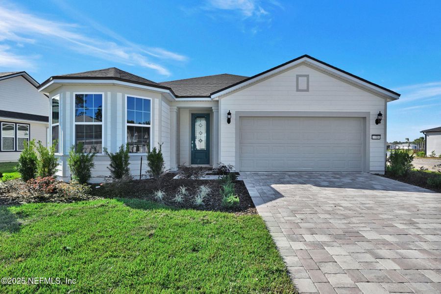 Front exterior of a new home in Del Webb Saint Johns, St. Johns, FL, highlighting curb appeal (Image 19).