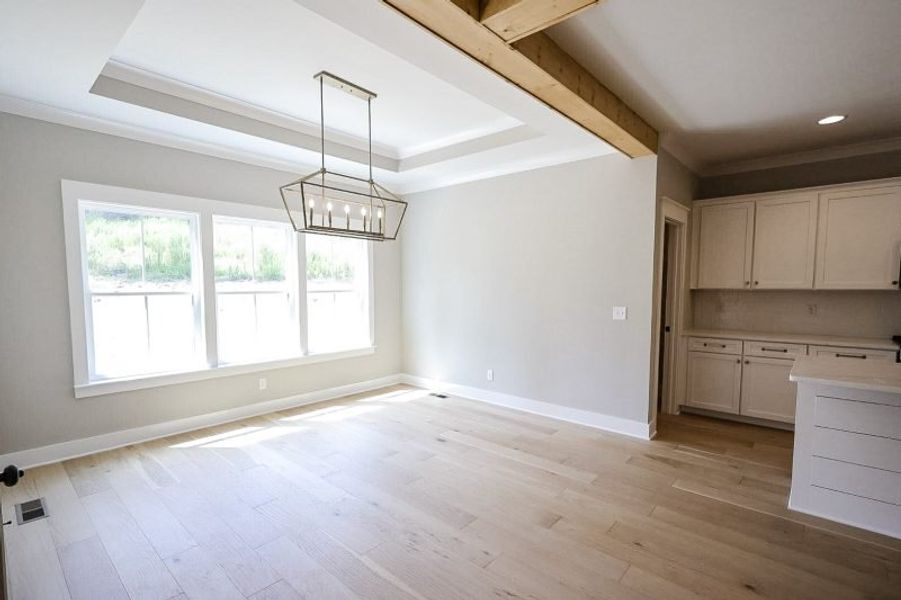 Spacious, unfurnished interior of a new home in Baker Road, Birchwood (Image 58).