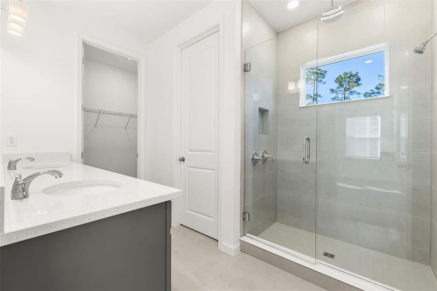 Furnished interior view inside a new home in Serenade at Ovation, Winter Garden (Image 10).