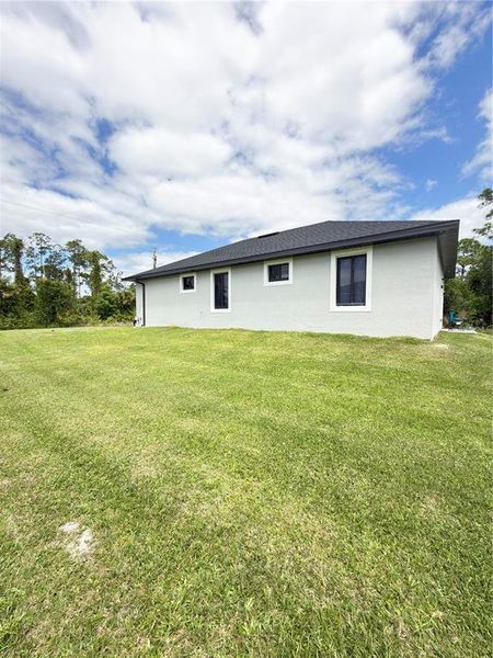 Exterior details and patio area of a home in , Lehigh Acres (Image 3).
