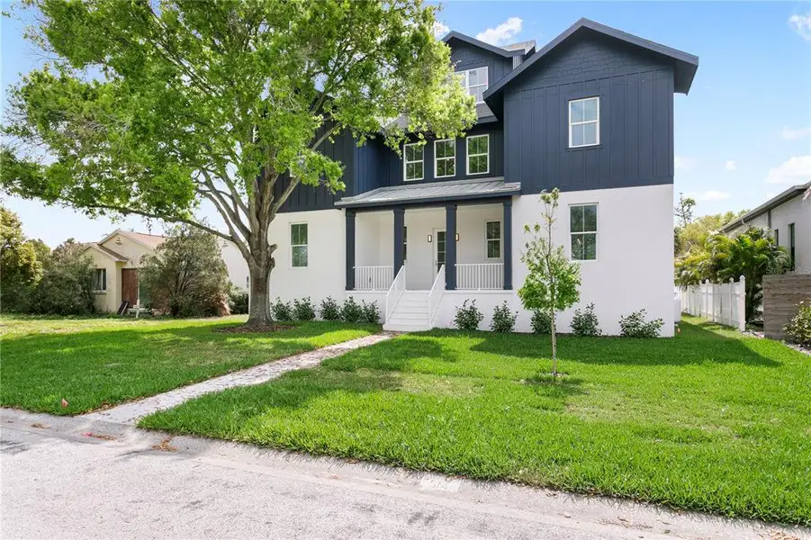 Front exterior of a new home in , St. Petersburg, FL, highlighting curb appeal (Image 2). Front exterior of a new home in , St. Petersburg, FL, highlighting curb appeal (Image 2).