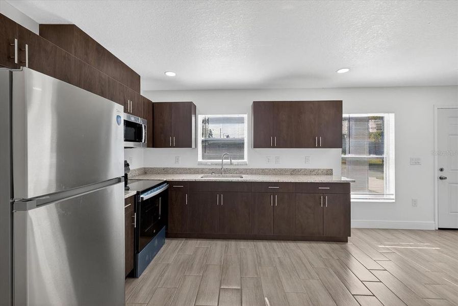 Furnished interior view inside a new home in , Holiday (Image 6). Furnished interior view inside a new home in , Holiday (Image 6).