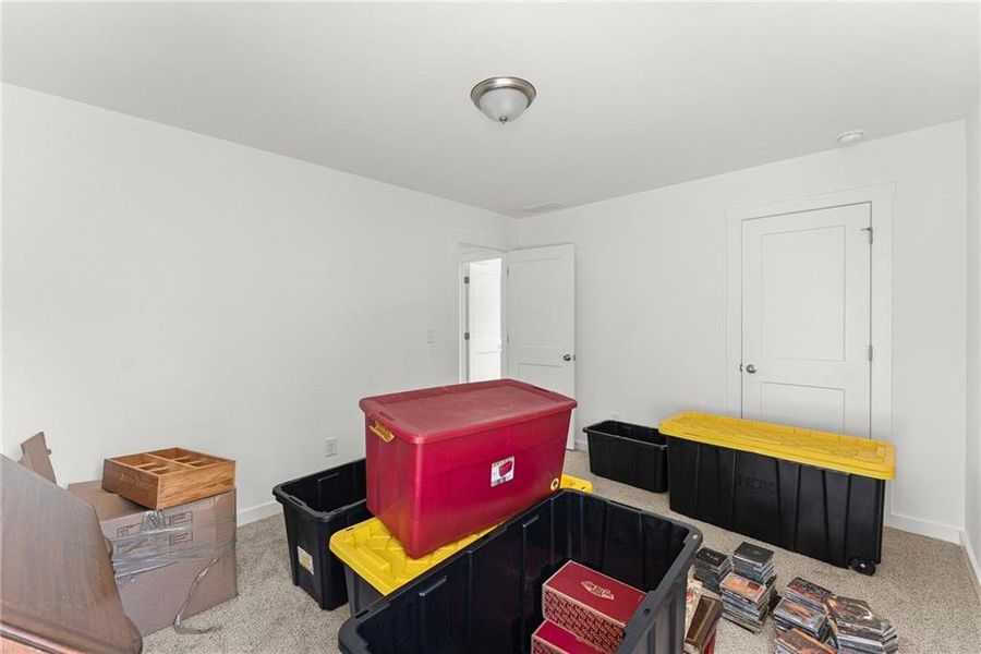 Furnished interior view inside a new home in Ellington Farms, Statham (Image 28).