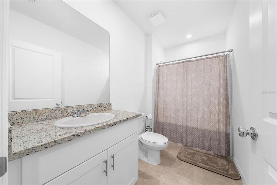 Furnished interior view inside a new home in Waterstone, Groveland (Image 18).