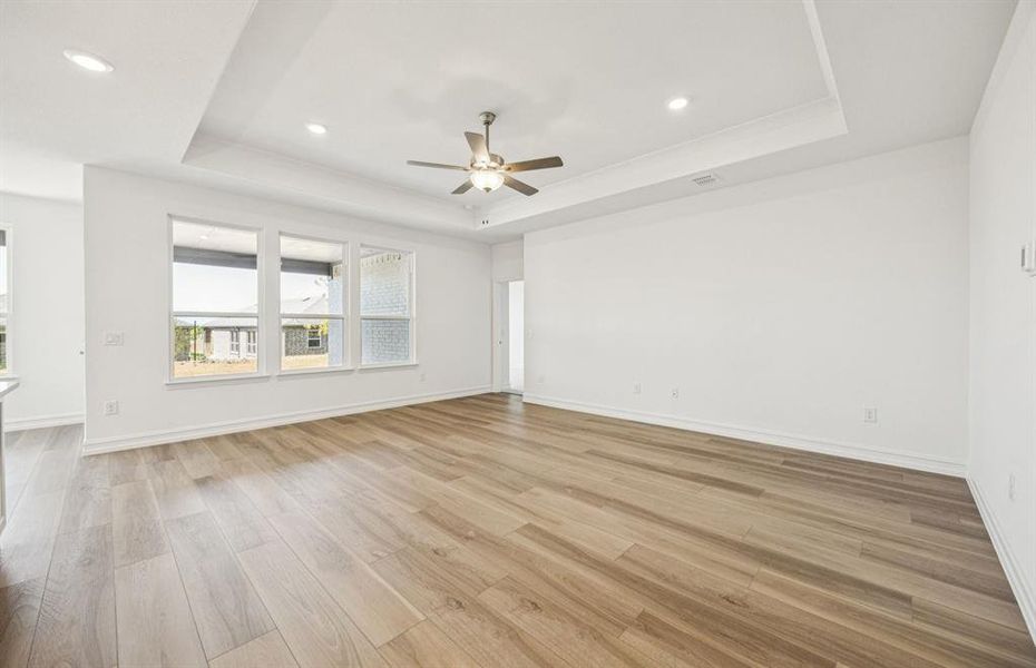 Airy gathering room showcases open concept floorplan *Real home pictured Airy gathering room showcases open concept floorplan *Real home pictured