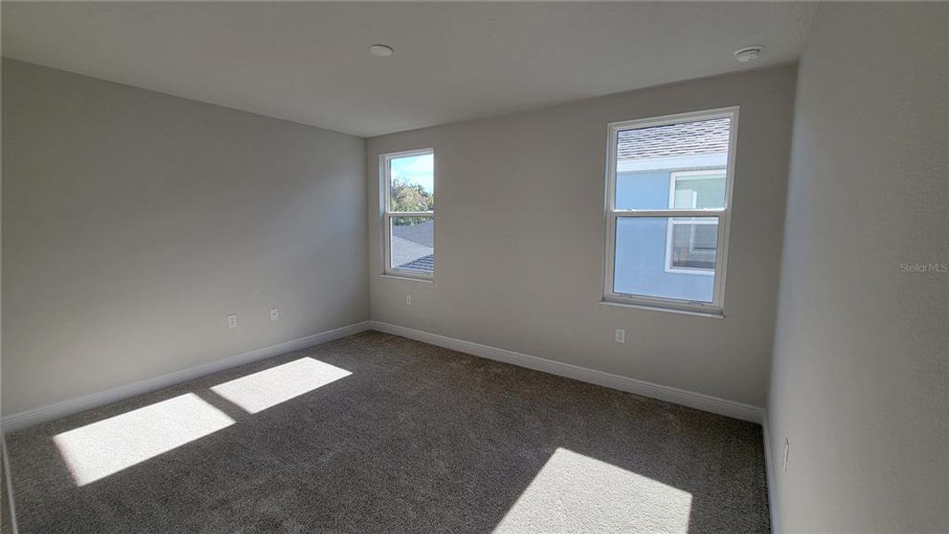 Spacious, unfurnished interior of a new home in , New Smyrna Beach (Image 13).