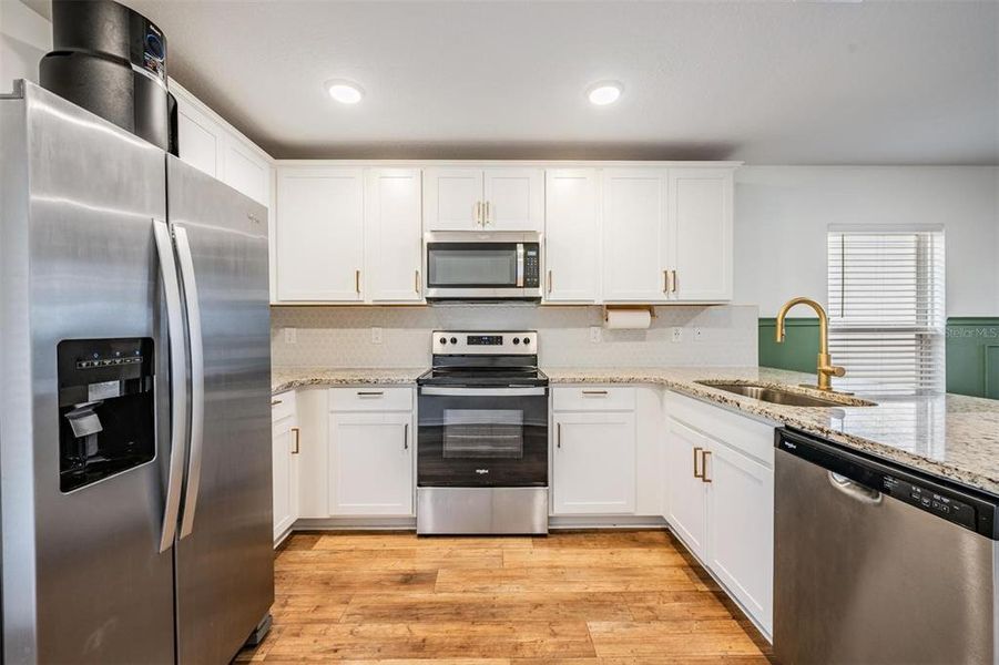 Furnished interior view inside a new home in Trilby Crossing, Brooksville (Image 7).