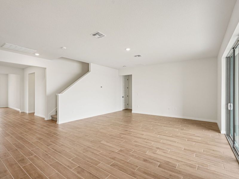Spacious, unfurnished interior of a new home in Oakfield Trails - Signature Series, Parrish (Image 8). Spacious, unfurnished interior of a new home in Oakfield Trails - Signature Series, Parrish (Image 8).