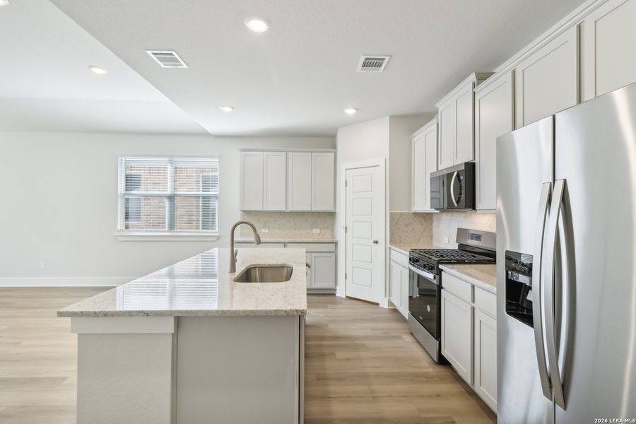 Furnished interior view inside a new home in Comanche Ridge, San Antonio (Image 11).
