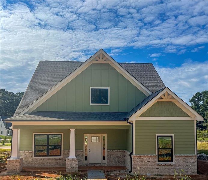 Front exterior of a new home in , Emerson, GA, highlighting curb appeal (Image 2).