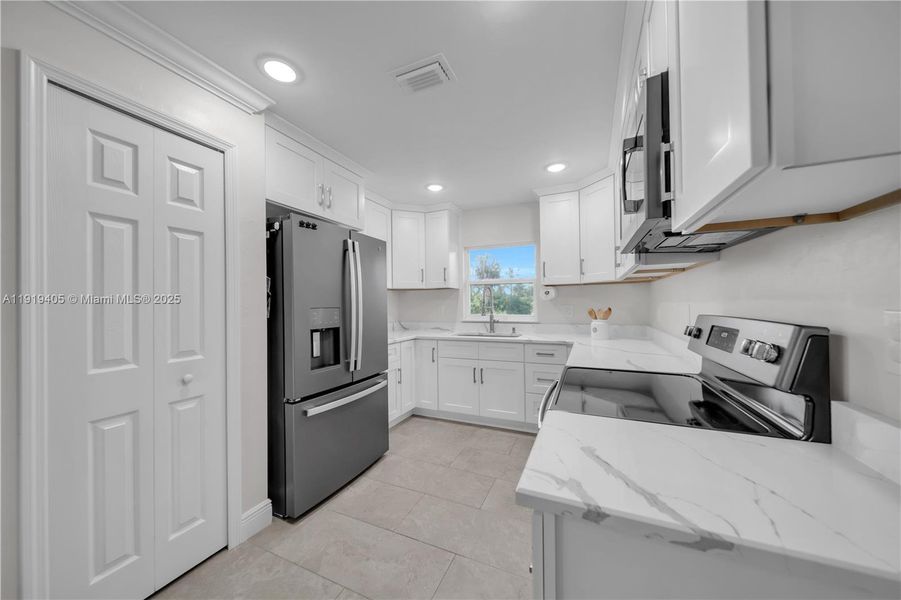 Furnished interior view inside a new home in , Lehigh Acres (Image 14). Furnished interior view inside a new home in , Lehigh Acres (Image 14).