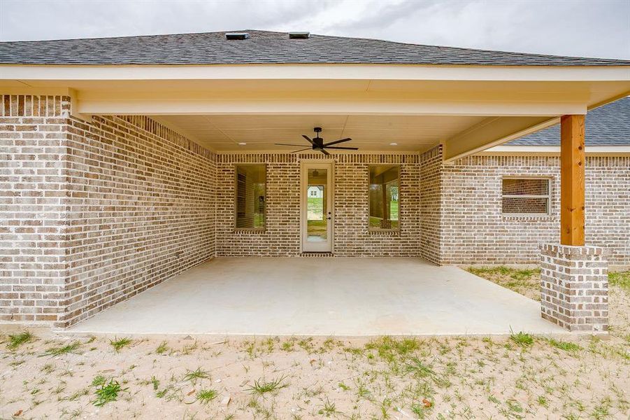Exterior details and patio area of a home in , Poolville (Image 25).