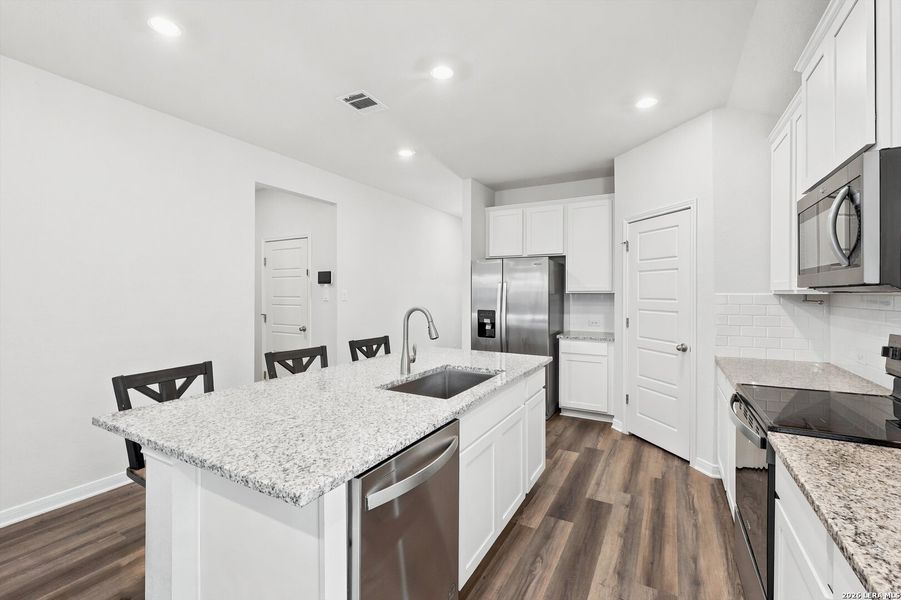 Furnished interior view inside a new home in , San Antonio (Image 32).