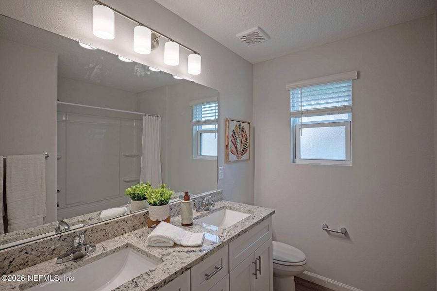 Furnished interior view inside a new home in , Jacksonville (Image 31).