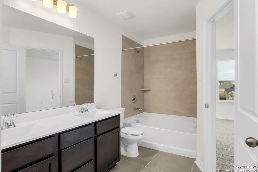 Furnished interior view inside a new home in Southton Cove, Elmendorf (Image 4).