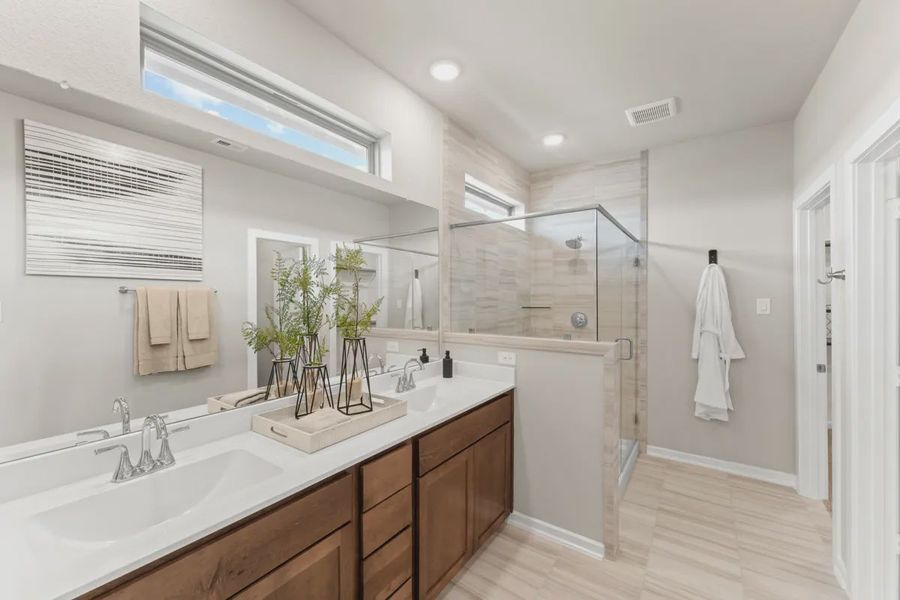 Representative furnished interior of a home built from the Capeside by Chesmar Homes in Meridiana Courtyard Collection, Manvel (Image 10).
