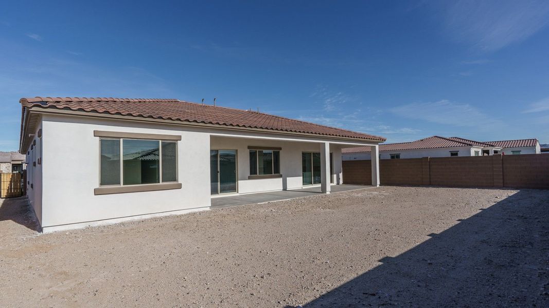 Exterior details and patio area of a home in Harmony at Montecito in Estrella, Goodyear (Image 21).