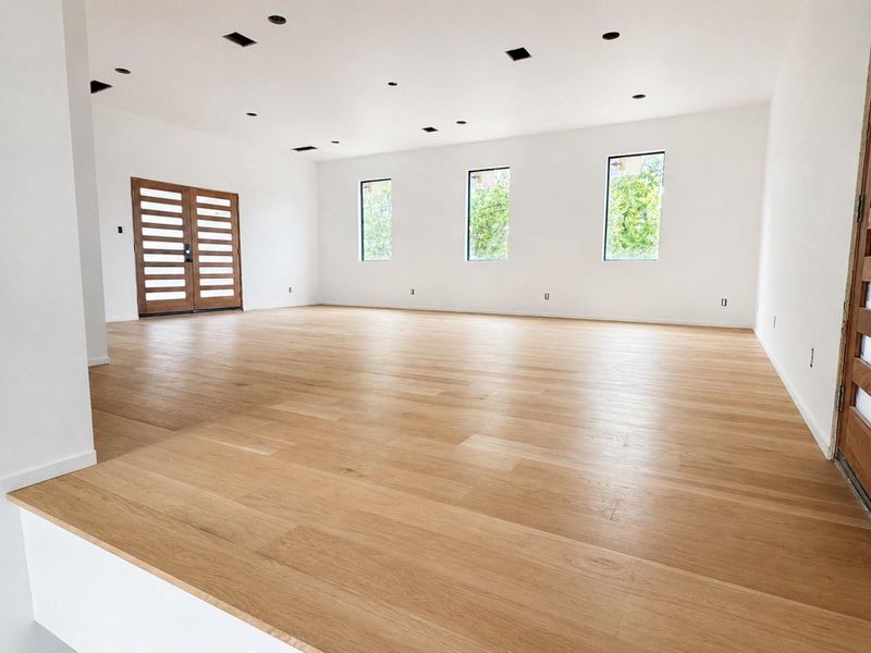Versatile third floor living area with direct access to a large bedroom and the private terrace