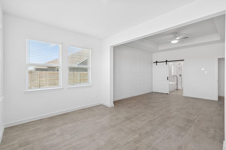 Relaxing sitting room in the primary suite (*Photo not of actual home and used for illustration purposes only.)