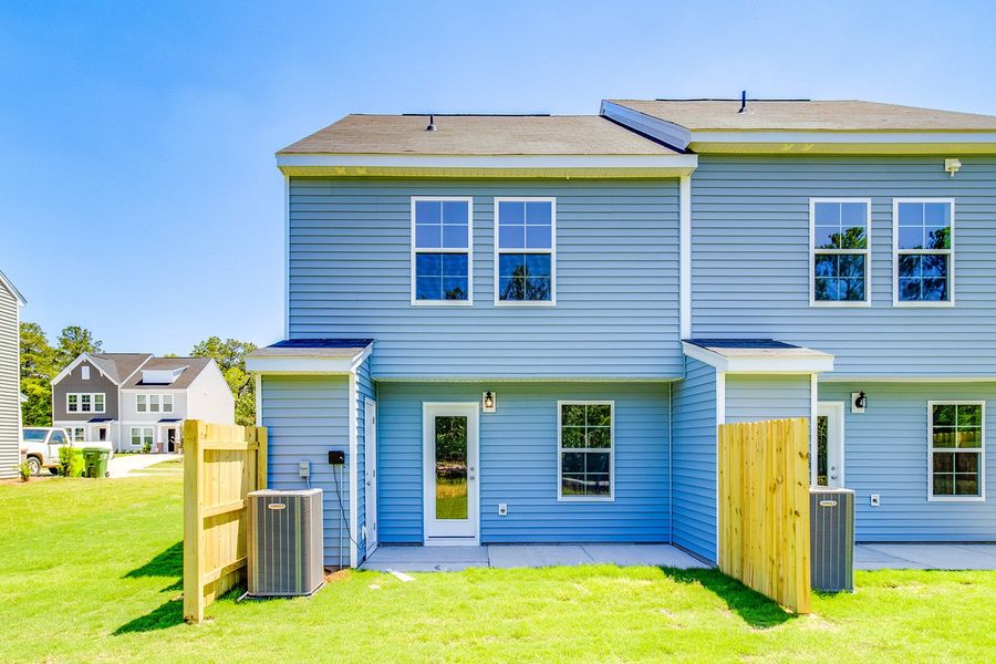 Exterior details and patio area of a home in Padgett Commons, Hopkins (Image 4).